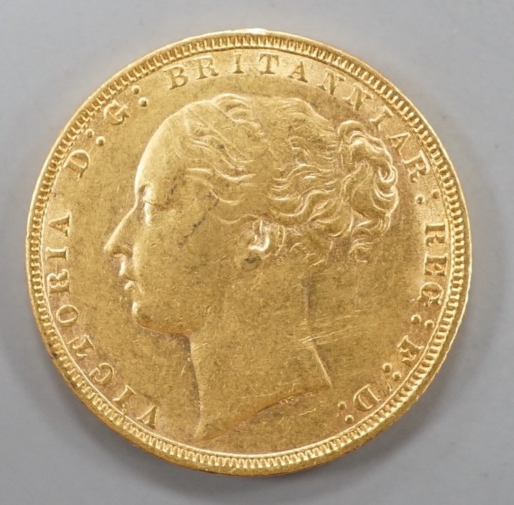 A Victoria 1872 gold sovereign.